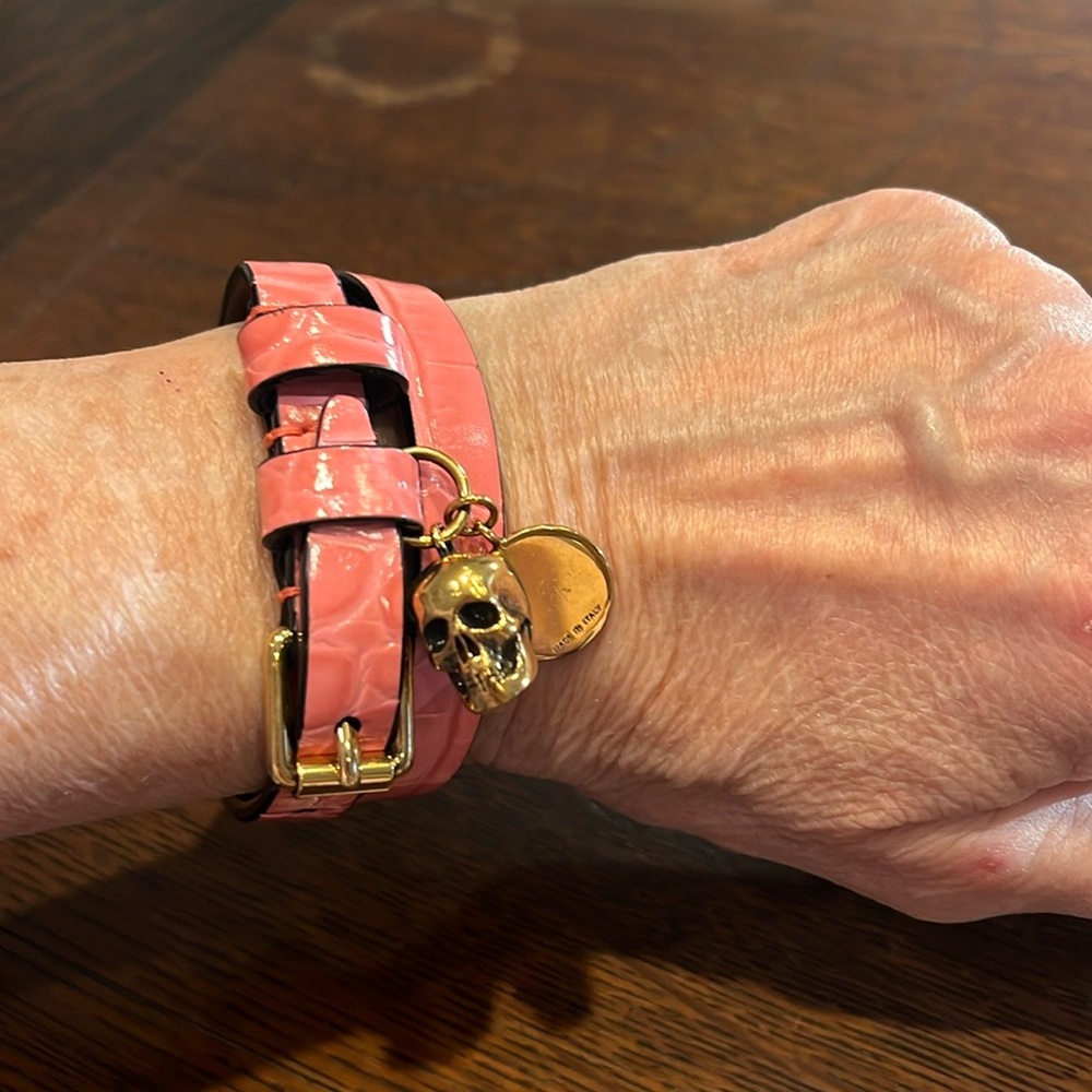 Alexander McQueen pink crocodile wrap bracelets.